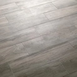 Lifeproof Shadow Wood 6 in. x 24 in. Porcelain Floor and Wall Tile (14.55 sq. ft. / case) -Lifeproof Sales Store shadow wood lifeproof porcelain tile lp33624hd1pr 77 1000
